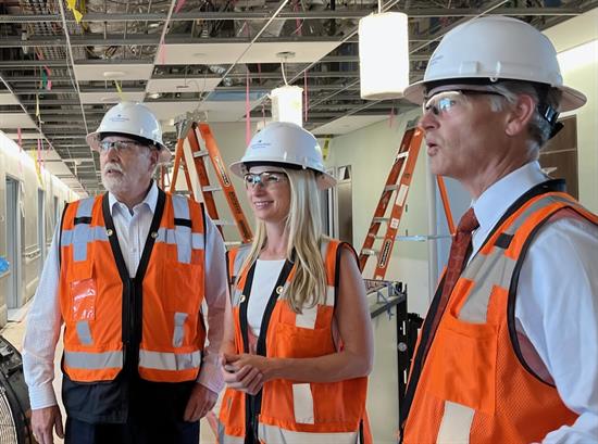 Congresswoman Brittany Pettersen stands in a construction site