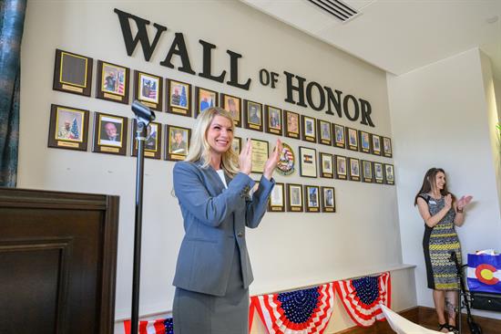 Rep. Pettersen helps unveil the Wall of Honor