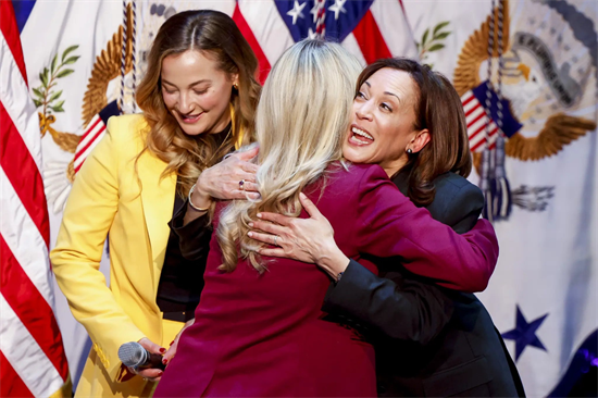 Vice President Kamala Harris hugging Rep. Brittany Pettersen